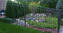 Rackable Fence Panels Black San Marino Aluminum Fence Installed on Sloped Terrain